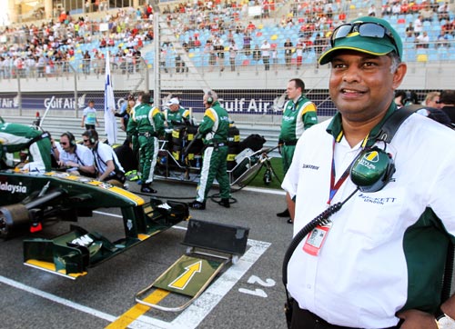 A happy Tony Fernandes on the Bahrain grid