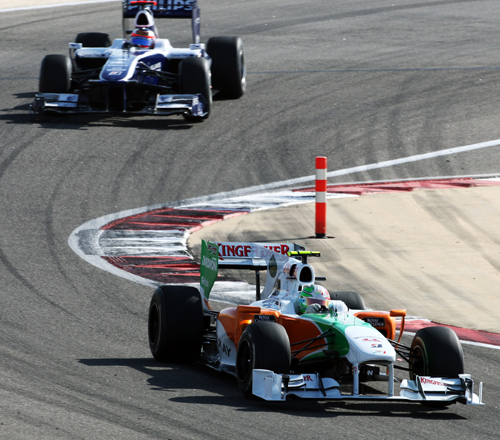 Tonio Liuzzi leads Rubens Barrichello