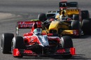 Lucas di Grassi leads Renault's Robert Kubica