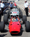 John Surtees prepares to hit the track in his title-winning 1964 Ferrari 158