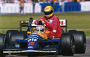 Nigel Mansell gives title-rival Ayrton Senna a lift back to the pits