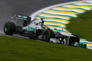 Lewis Hamilton on track using intermediate tyres