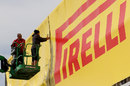 A Pirelli sign is installed at the track
