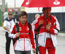 Fernando Alonso arrives at the circuit on Saturday morning