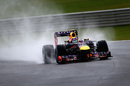Mark Webber pilots his Red Bull through the rain