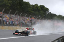 Romain Grosjean at speed on full wet tyres