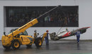 Sergio Perez's damaged McLaren is recovered