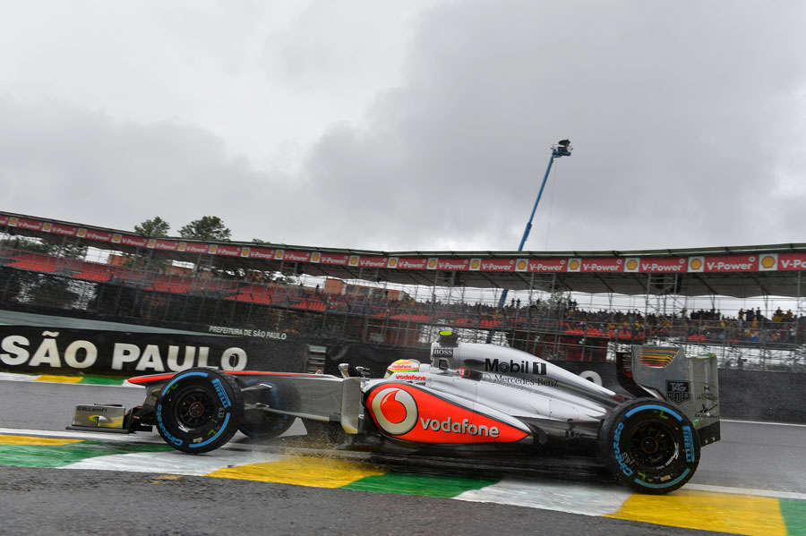 Sergio Perez leaves the pits on full wet tyres
