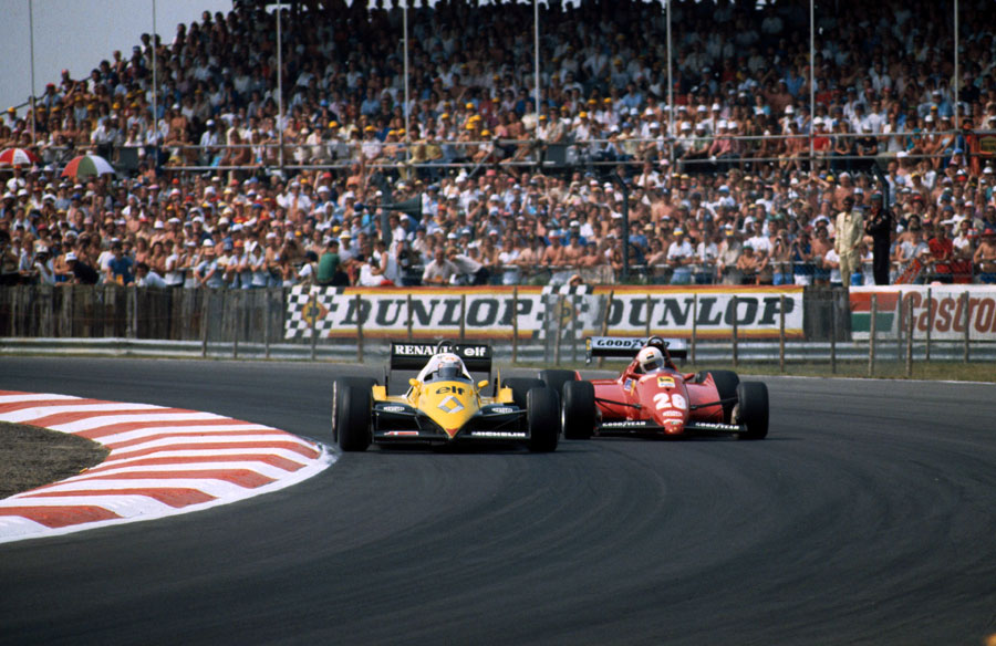 Alain Prost finds a way past Rene Arnoux at Copse
