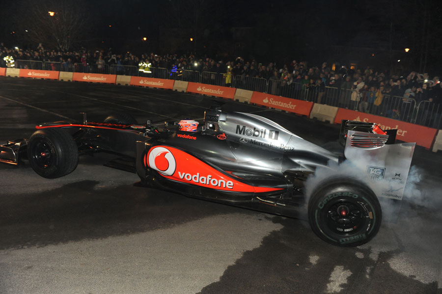 Jenson Button performs doughnuts in his home town of Frome