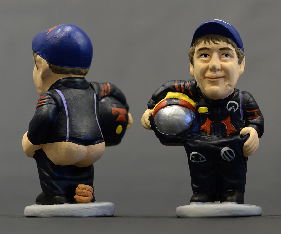 A traditional Catalonian caganer - a ceramic figurine - of Sebastian Vettel, apparently