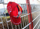 A cap with Dutch handwriting reading 'get well soon, number one' near the entry of the Michael Schumacher kart-centre