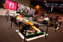 Cars on display at the F1 Racing stand at the Autosport International Show