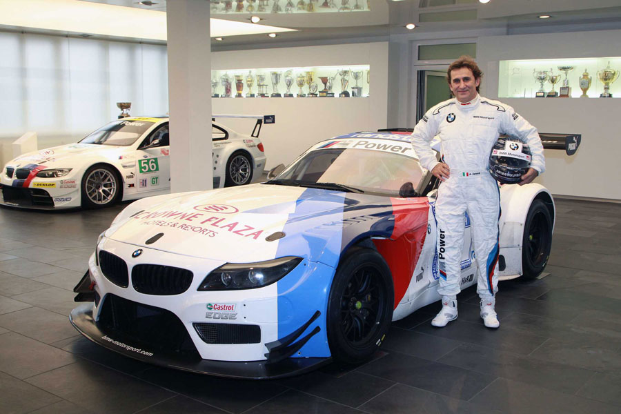 Ex-F1 driver and Paralympic gold medalist Alex Zanardi poses for a photo on his return to motorsport