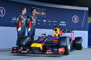 Sebastian Vettel and Daniel Ricciardo stand with the RB10 in Jerez