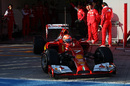 Kimi Raikkonen gets behind the wheel of his #7 Ferrari F14T for the first time