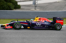 Reigning world champion Sebastian Vettel behind the wheel of the RB10 