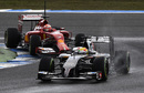 Esteban Gutierrez and Kimi Raikkonen get to grips with the wet tyre