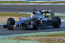 Jenson Button navigates a chicane on a drying Jerez track