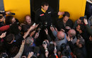 A media scrum gathers to question Renault Sport's Remi Taffin