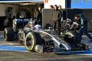 Jenson Button's heads out into the early-morning sun