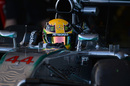 Lewis Hamilton gets back into the Mercedes W05 after sitting out the second day of testing
