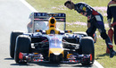 Daniel Ricciardo looks at his Red Bull after it stopped at Turn Seven 
