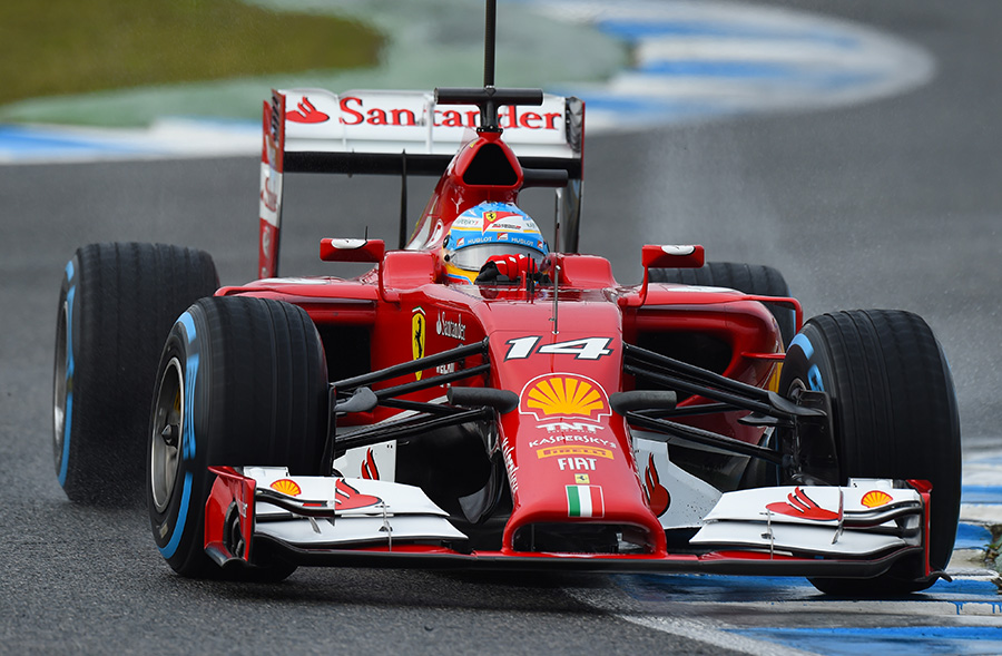 Fernando Alonso guides the F14 T through a chicane
