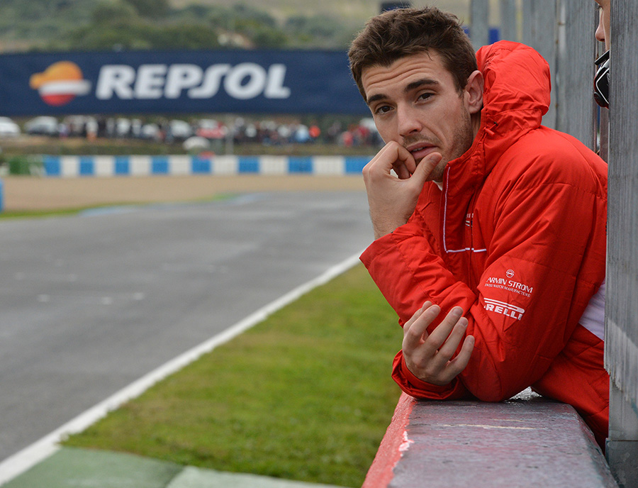 After a tough day Jules Bianchi watches on from the pit wall
