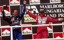 Ayrton Senna congratulates Nigel mansell on clinching the drivers' title in Hungary