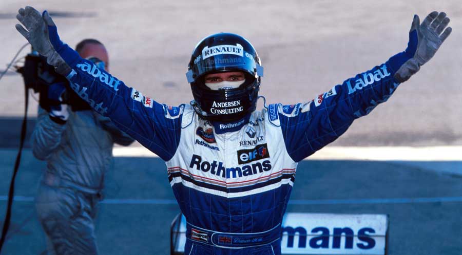 Damon Hill celebrates clinching the drivers' championship with victory in Suzuka