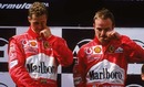 An embarrassed Michael Schumacher and Rubens Barrichello on the podium after the 2002 Austrian Grand Prix