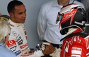 Lewis Hamilton congratulates Kimi Raikkonen on beating him to the drivers' title in Brazil