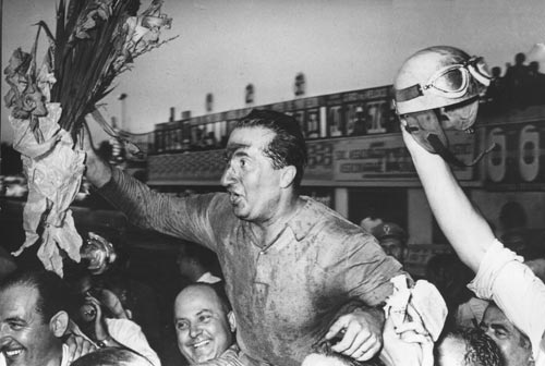Alberto Ascari celebrates winning the Italian Grand Prix