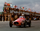 Alberto Ascari crosses the line to win the British Grand Prix