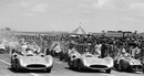 The Mercedes of Juan Manuel Fangio and Karl Kling accelerate away from the field at the start of the French Grand Prix