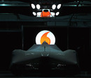 The McLaren MP4-25 under wraps in the team garage