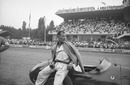 Stirling Moss pushed his car across the line for 10th at the Italian Grand Prix