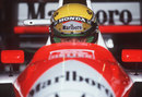 Ayrton Senna sits in his car ahead of the US Grand Prix