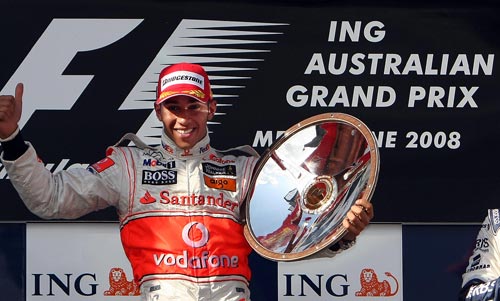 Lewis Hamilton celebrates winning the 2008 Australian Grand Prix