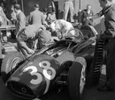 Mechanics work on Mike Hawthorn's Ferrari 553 'Squalo', which would win the Spanish Grand Prix