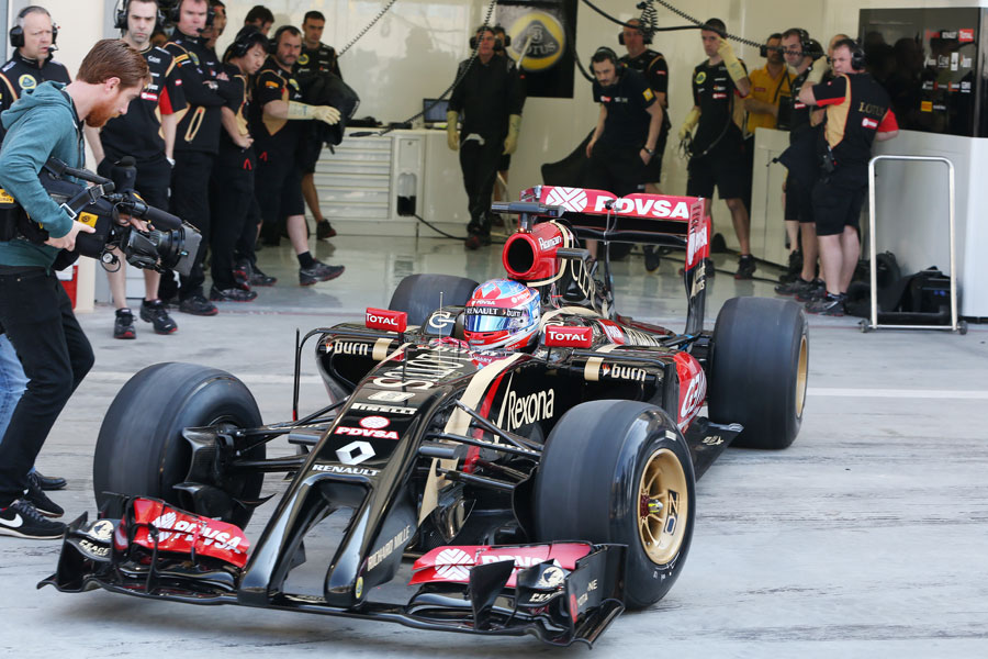 Romain Grosjean leaves the pits for the first time in the Lotus E22