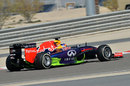 Daniel Ricciardo on track in a Red Bull doused in flo-vis paint