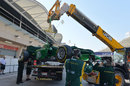 Marcus Ericsson's Caterham is returned the pits