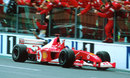 Michael Schumacher crosses the line to claim his fifth world drivers' championship