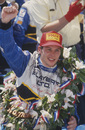 Jacques Villeneuve celebrates in Victory Lane