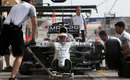 Kevin Magnussen waits on a wheel change in the McLaren