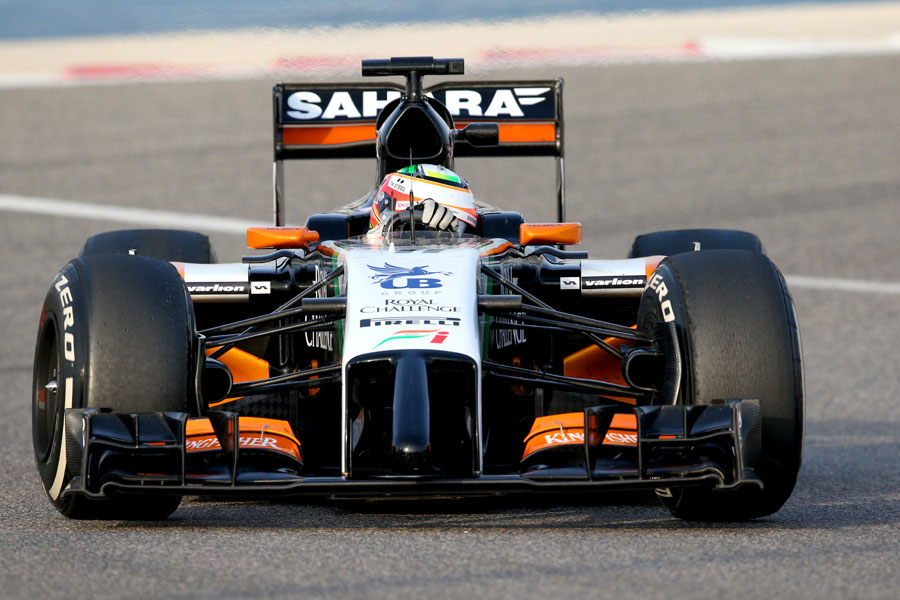 Sergio Perez enters a corner in the Force India