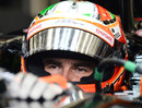 Sergio Perez waiting in the cockpit in between testing runs