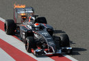 Adrian Sutil's Sauber comes to a halt with a lick of flame from the rear 